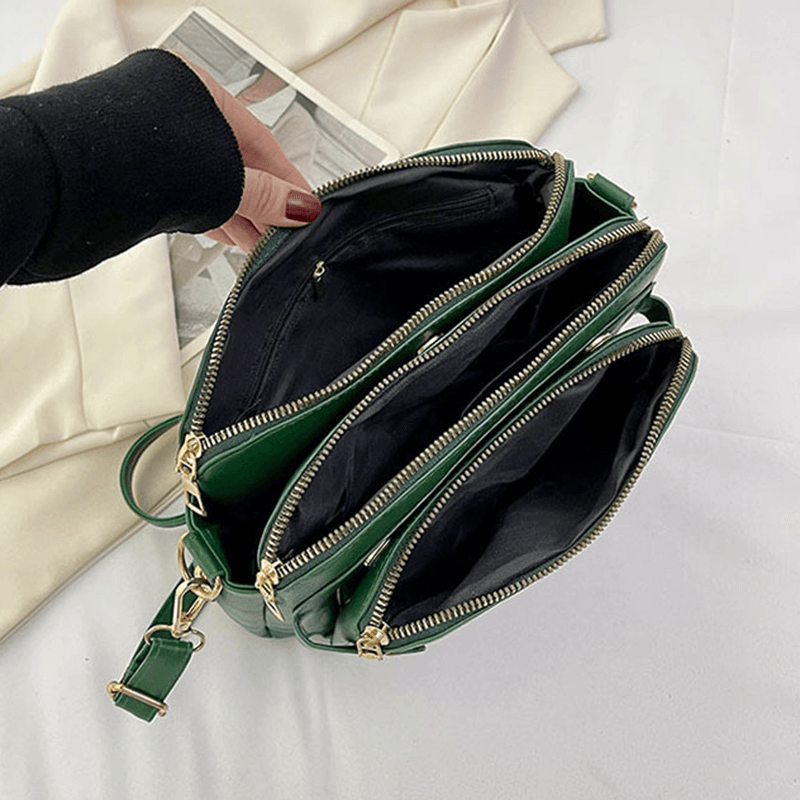 Læder crossbody skuldertaske med justerbar rem og lynlåslukning | Nimble
