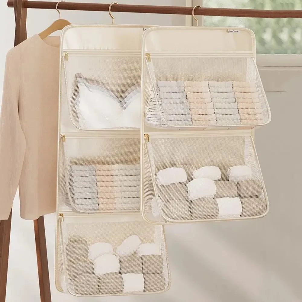 Hængende garderobeorganizer med netlommer lynlås foldbart pladsbesparende design | Ninon