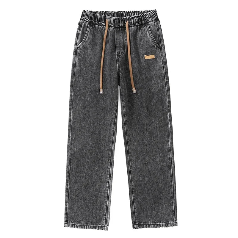 Løstsiddende herrejeans i denim med brede lige ben mellemhøj talje | Paul