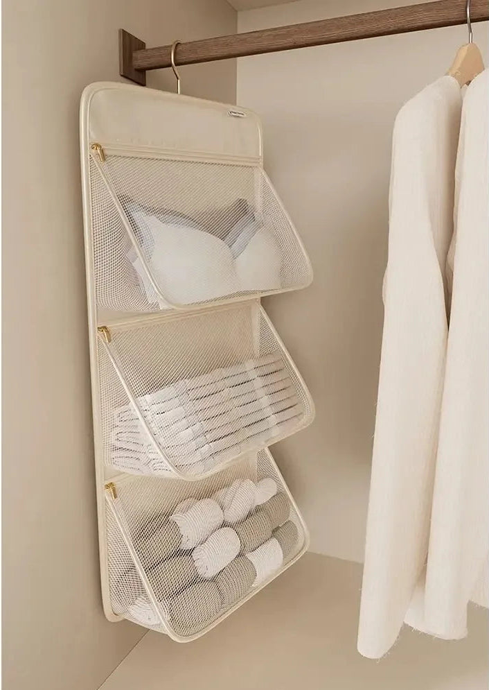 Hængende garderobeorganizer med netlommer lynlås foldbart pladsbesparende design | Ninon