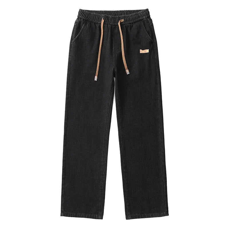 Løstsiddende herrejeans i denim med brede lige ben mellemhøj talje | Paul